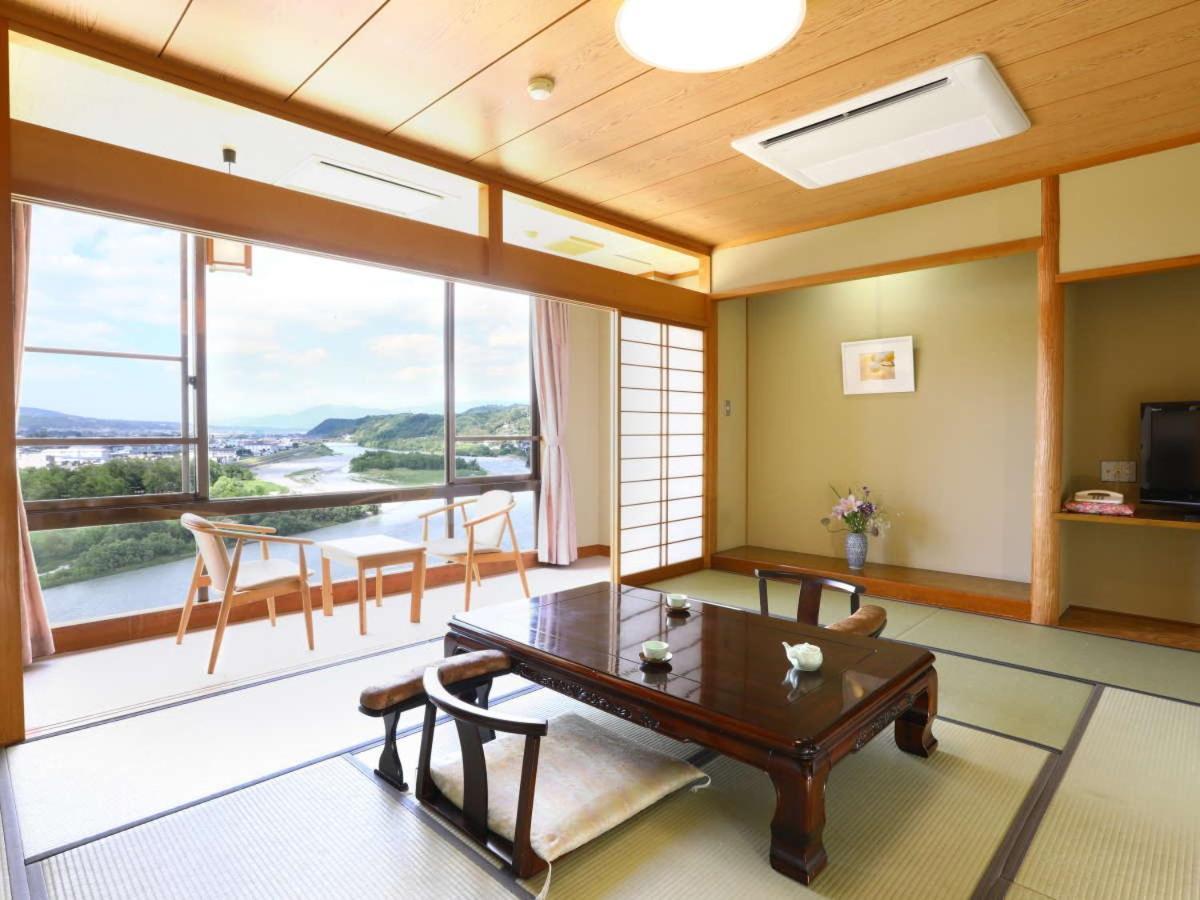 Yoshinotei Hotel Iida Bagian luar foto