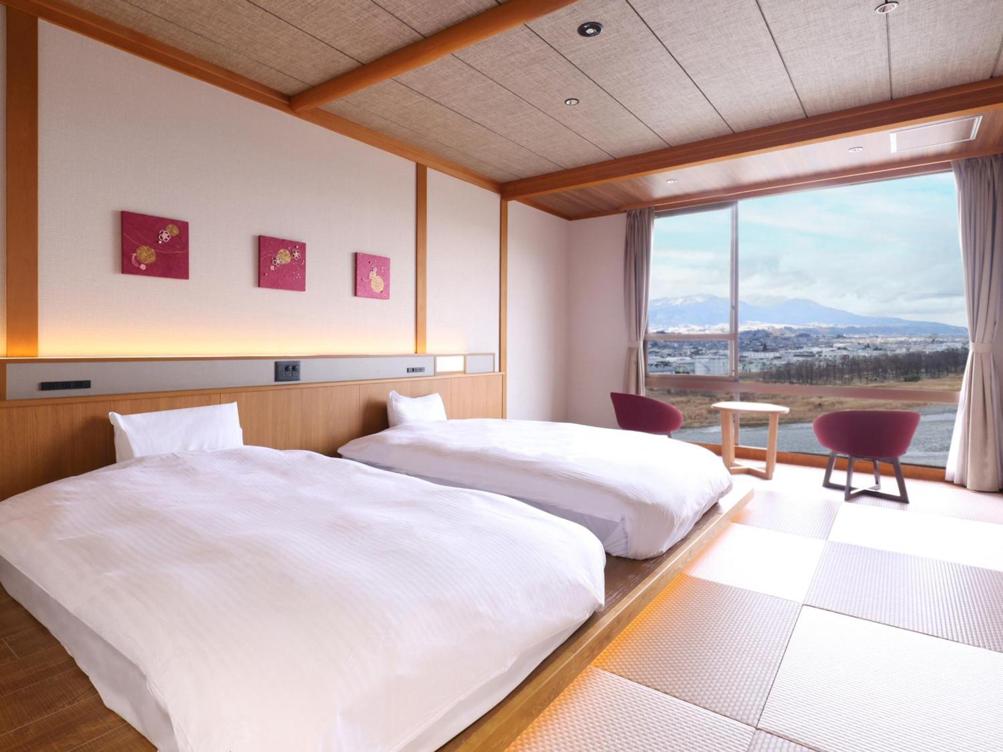 Yoshinotei Hotel Iida Bagian luar foto