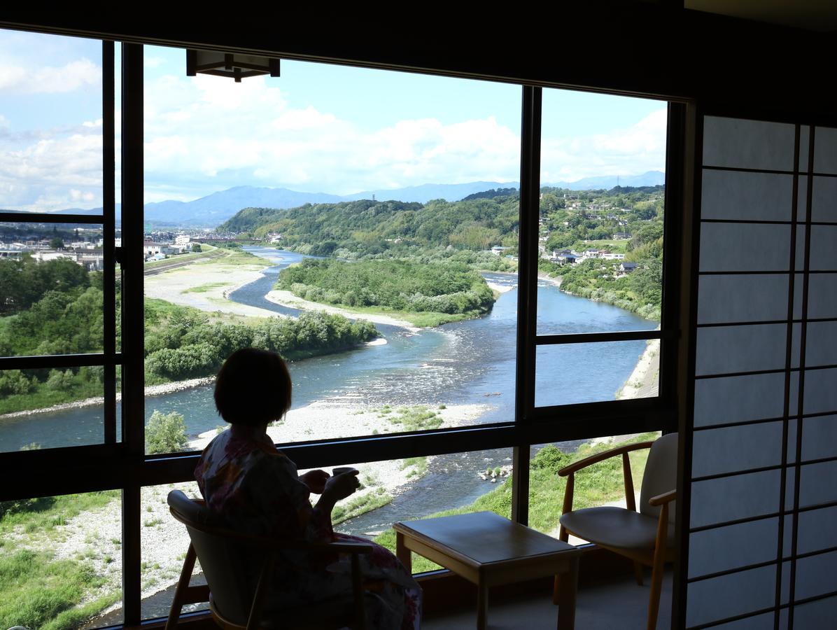 Yoshinotei Hotel Iida Bagian luar foto