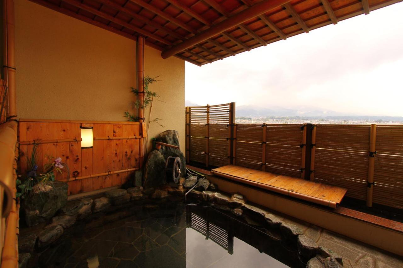 Yoshinotei Hotel Iida Bagian luar foto